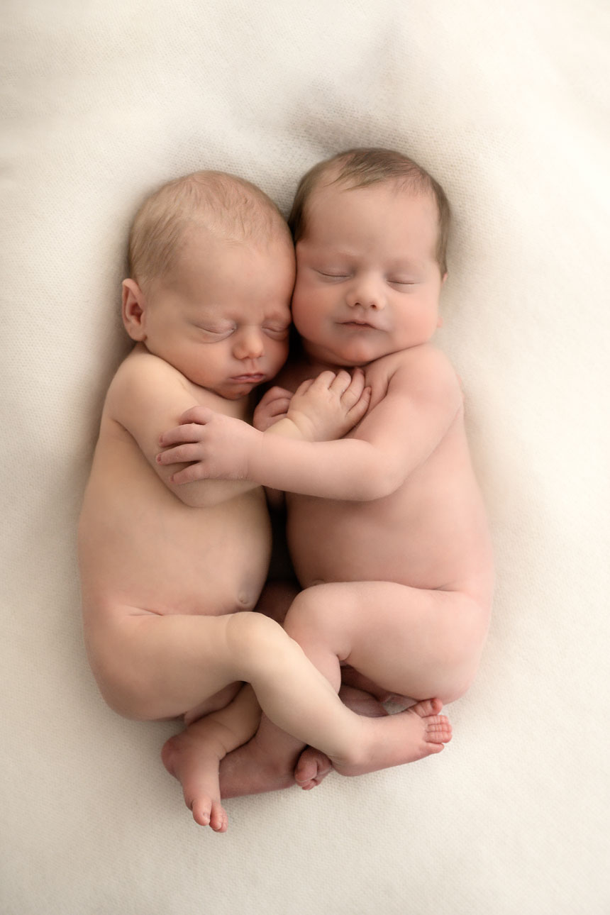 Twin newborn photograph, taken in Romford, Essex. Timeless beautiful identical twin boys