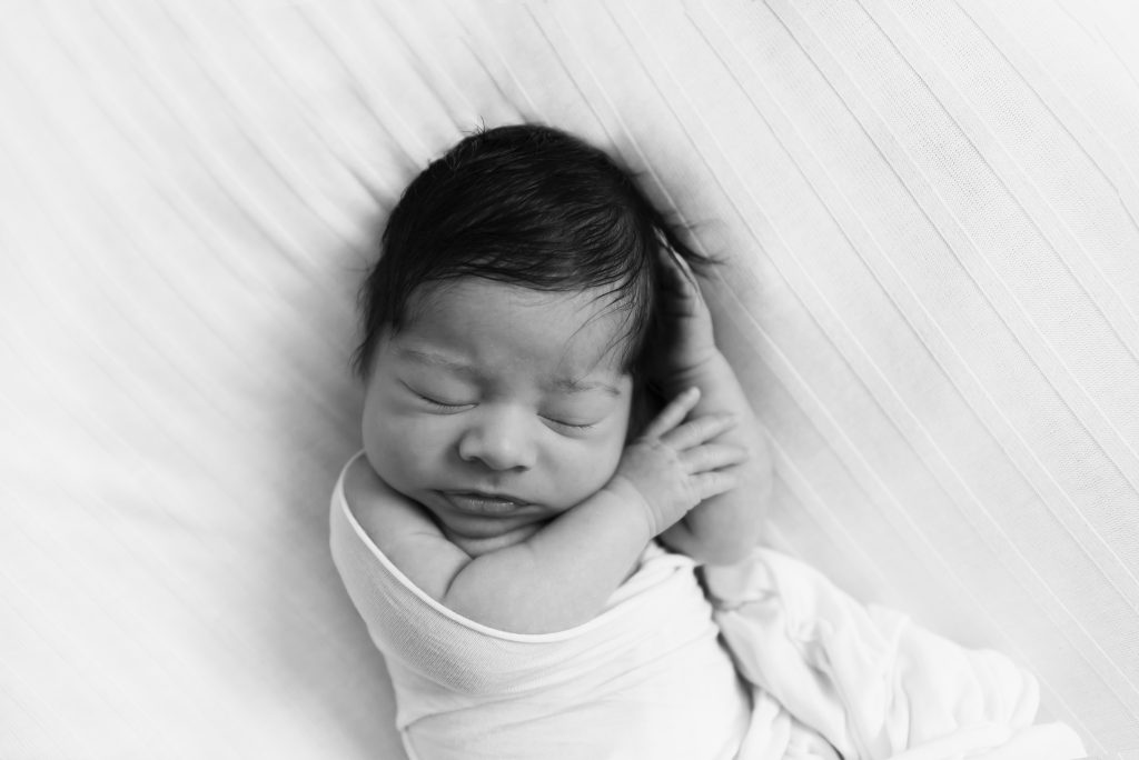 nautral beautiful sleeping newborn baby in brentwood essex